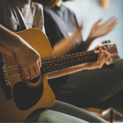 Worship service featuring a guitar player